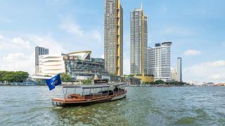 View from the River of Hotel Exterior and Hilton Shuttle Boat 